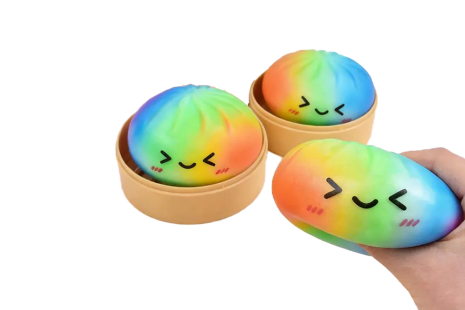 Squishy dumpling foam 8,5cm in stoommand regenboog 10cm